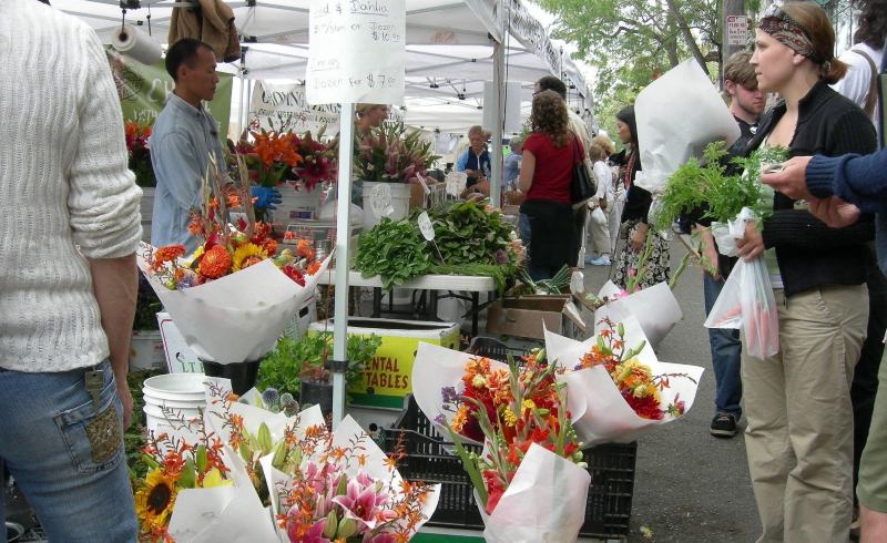 A photo of a Florist’s booth in the Ballards Farmers Market