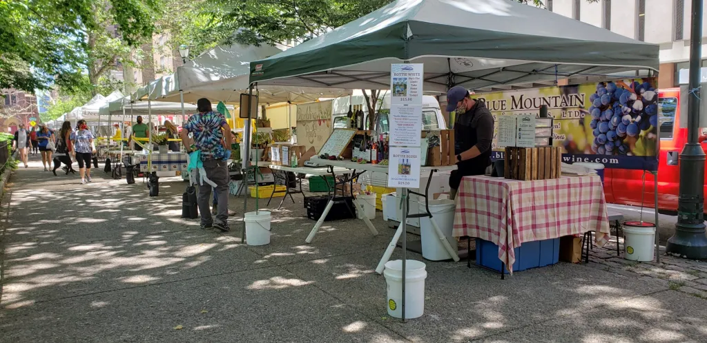 A picture of vendor booths at the Rittenhouse Farmers Market